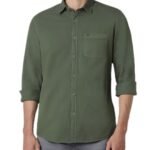 The green shirt is made from cotton and has a button down collar